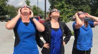 Staff looking at Eclipse